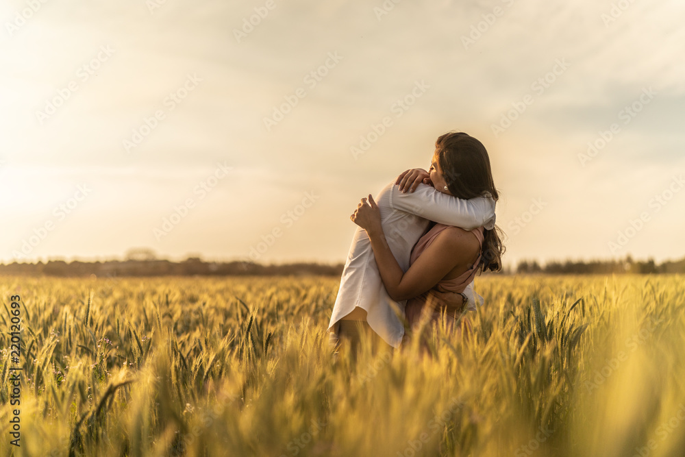 Romantic Couple on a Love Moment at gold wheat field - Holambra, Sao Paulo, Brazil Romantic Couple on a Love Moment at gold wheat field - Holambra, Sao Paulo, Brazil
