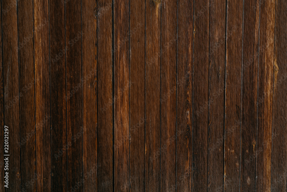 A lot of grungy ancient wooden planks in Spain. Wooden dark brown texture
A lot of grungy ancient wooden planks in Spain. Wooden dark brown texture