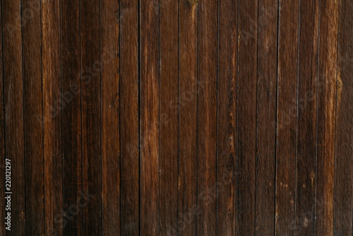A lot of grungy ancient wooden planks in Spain. Wooden dark brown texture 