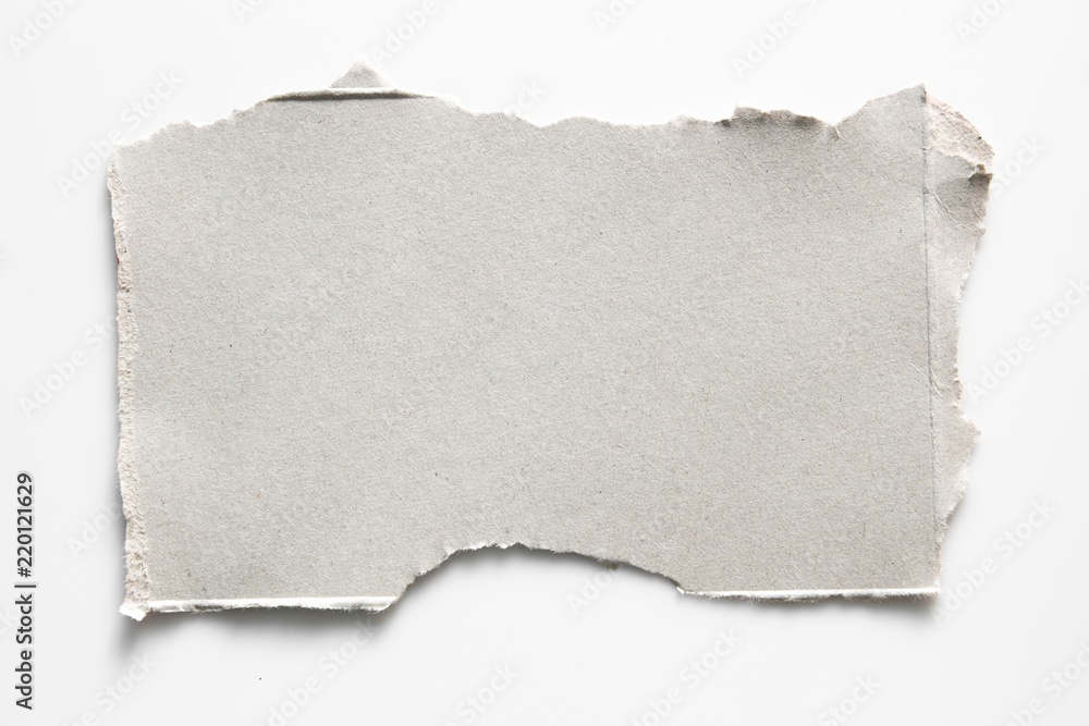 Obraz premium Brown corrugated texture paper torn on white background. rip of cardboard sheet used as a background .