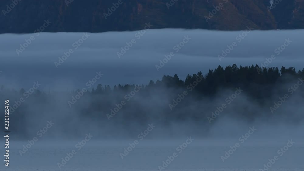 Fog Moving Over Jackson Lake at Dawn Fog Moving Over Jackson Lake at Dawn