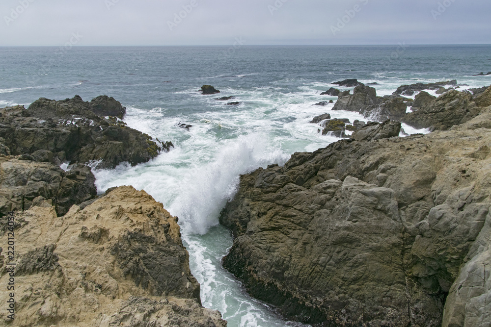 Waves crashing in high surf on the N. California coast