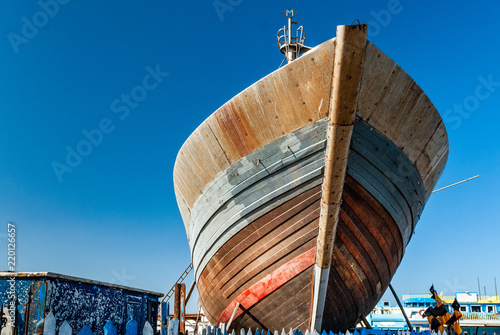 Canvas Print Repairs on the bow of a fishing boat in dry dock at the port of Essaouira in Mor