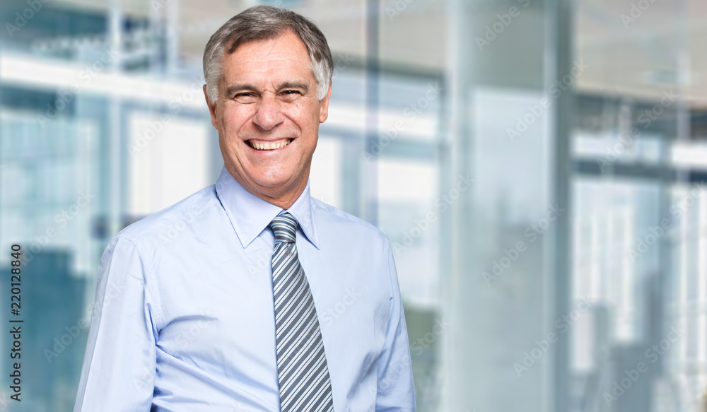 Closeup portrait of a confident mature business man Closeup portrait of a confident mature business man