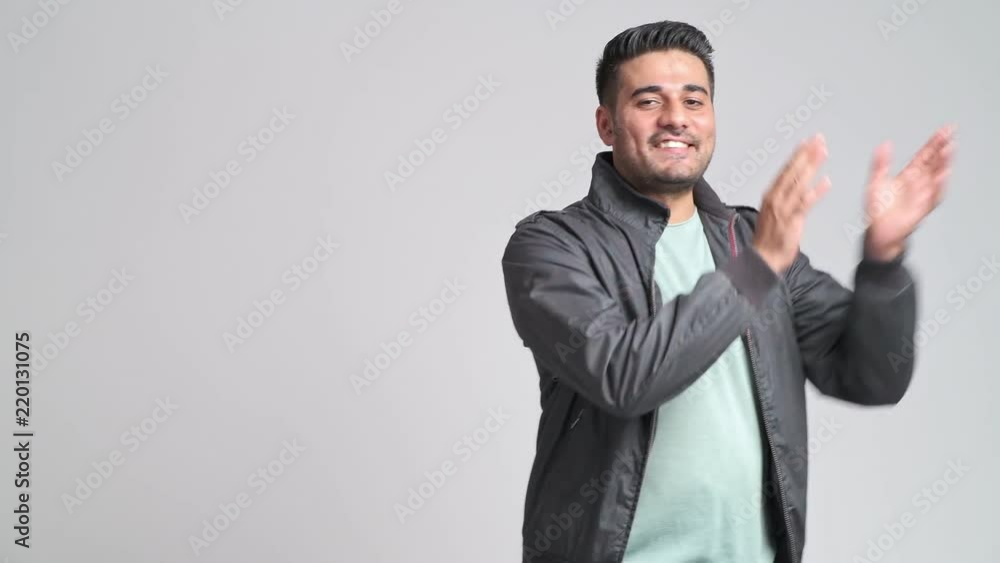 Bearded hipster dancing portrait. Young indian man in autumn clothing dancing in front of camera. Hipster lifestyle concept. Bearded hipster dancing portrait. Young indian man in autumn clothing dancing in front of camera. Hipster lifestyle concept.