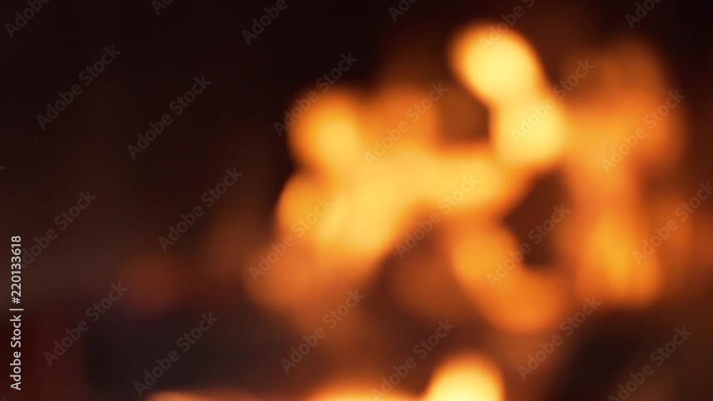 Abstract flames burning wood in a fireplace, in slow motion Abstract flames burning wood in a fireplace, in slow motion