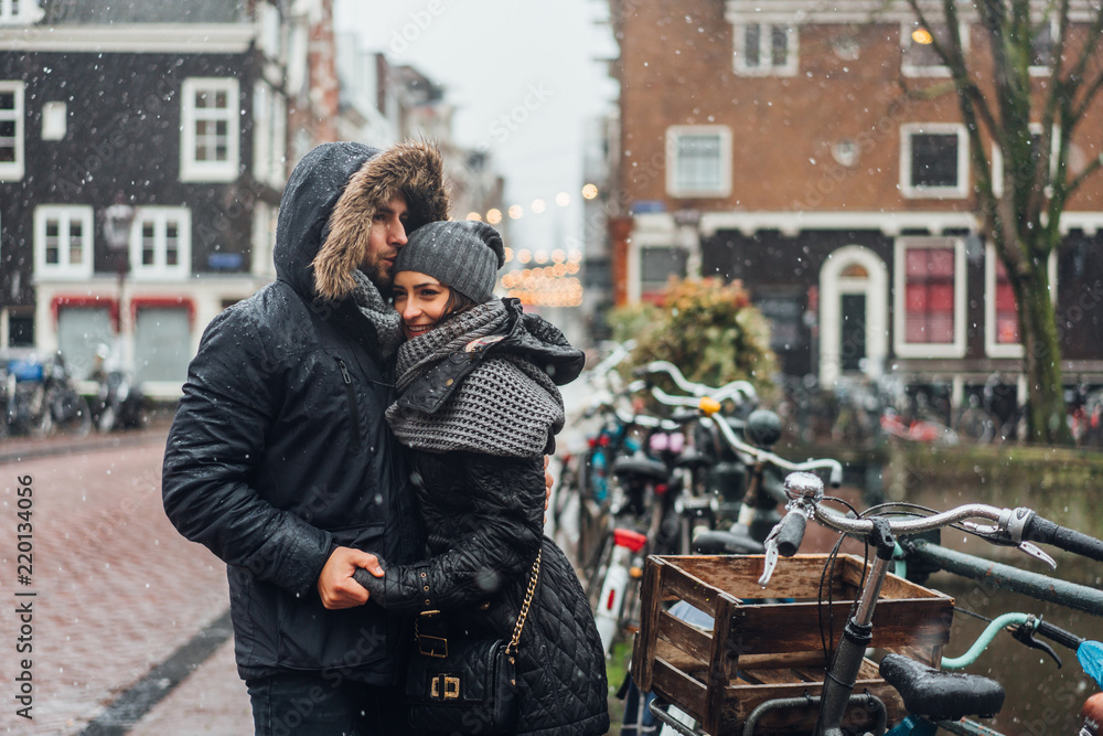 guy and girl in the street in the rain guy and girl in the street in the rain