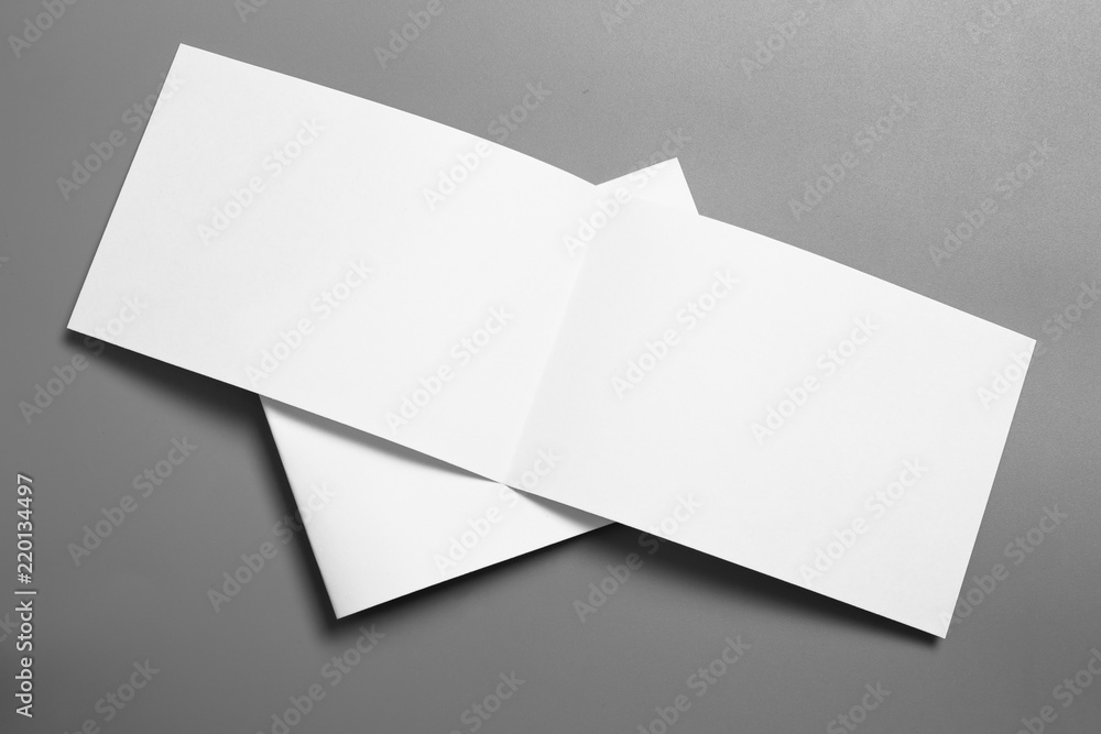 Blank portrait mock-up paper. brochure magazine isolated on gray, changeable background / white paper isolated on gray Blank portrait mock-up paper. brochure magazine isolated on gray, changeable background / white paper isolated on gray