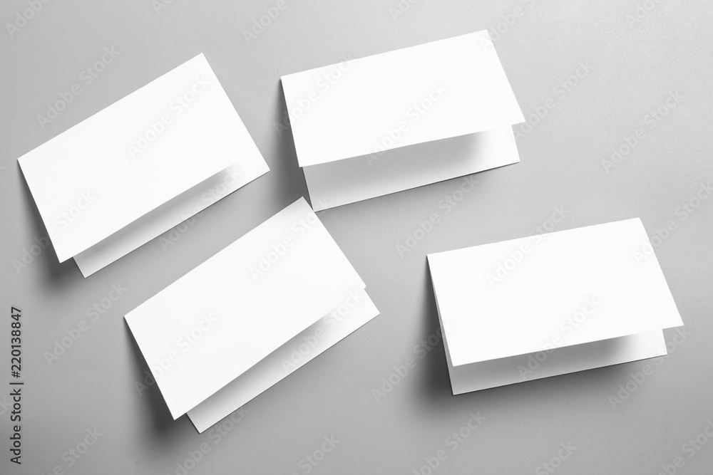 Blank portrait mock-up paper. brochure magazine isolated on gray, changeable background / white paper isolated on gray Blank portrait mock-up paper. brochure magazine isolated on gray, changeable background / white paper isolated on gray