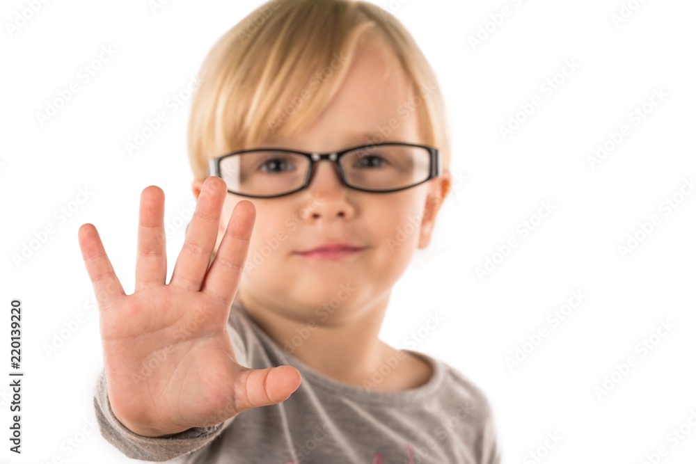 Portrait of a Young Girl Making Stop Gesture