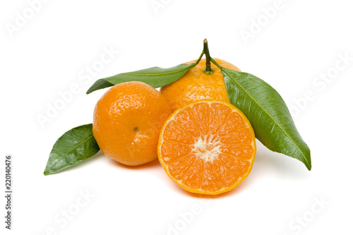 Tangerines or mandarines isolated on white background, orange whole exotic tropical fruits with green leaves and another citrus cut in half, healthy food, diet nutrition 