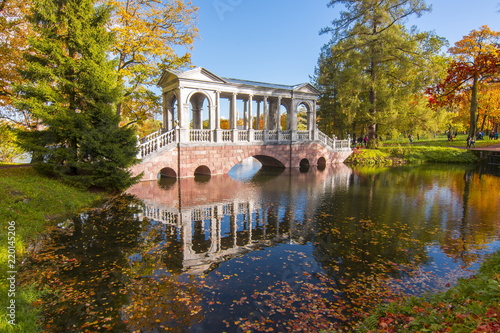 Marble bridge in autumn foliage in Catherine park, Tsarskoe Selo (Pushkin), St. Petersburg, Russia