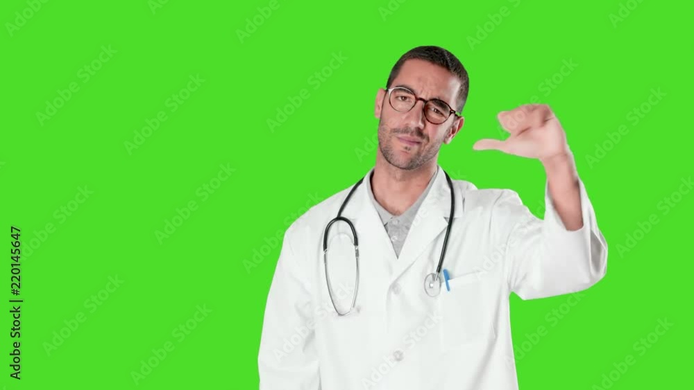 Loser young doctor against green background Loser young doctor against green background
