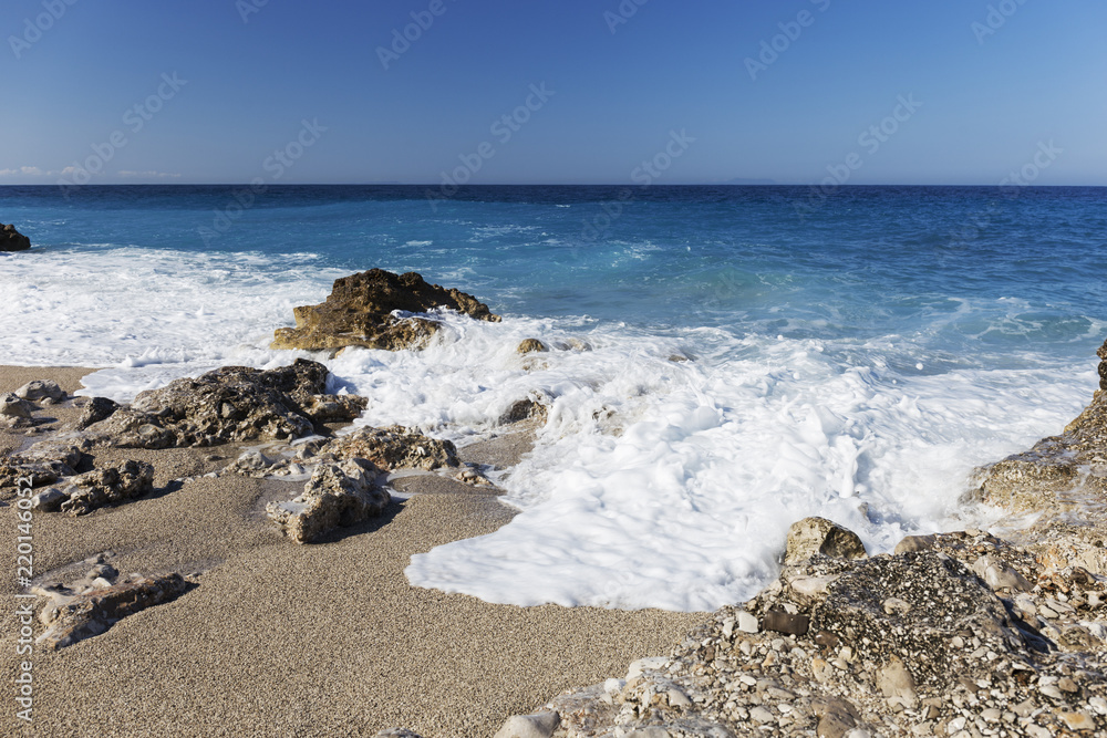 Albanian coast.beautiful view on the rock sea shore,blue sea and wave. Albanian coast.beautiful view on the rock sea shore,blue sea and wave.