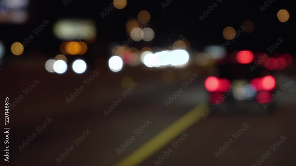 Abstract background of out of focus cars driving on a highway at night Abstract background of out of focus cars driving on a highway at night