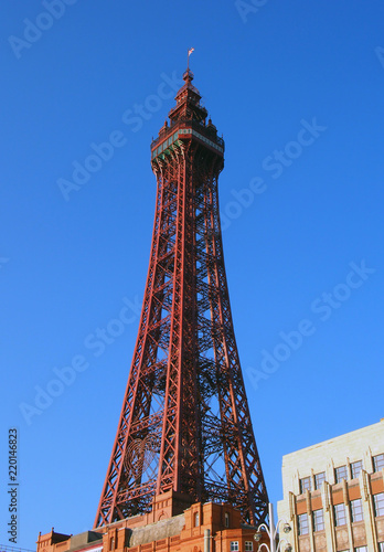 A vertical view of Blackpool tower in bright sunlight against a bright blue summer sky photo