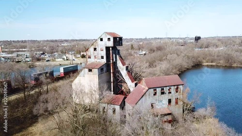 Aerial of an abandoned mill factory in Illinois suggests the decay of America's manufacturing era. photo