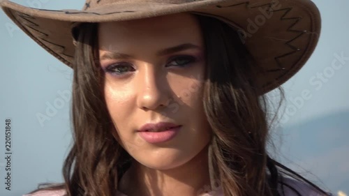 Beautiful cowgirl - close up view of the face 