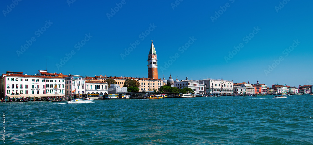 Venice. glimpse of the bell tower of the Basilica of San Marco from the Venetian lauga on the Grand Canal