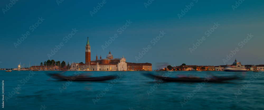 Venice. Gondolas with a choppy effect on the lagoon with the island background of San Giorgio Maggiore
