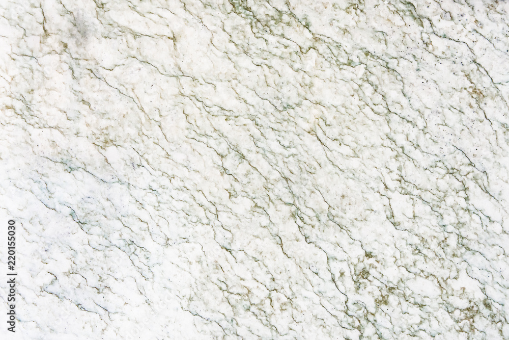 White marble slab with dark streaks White marble slab with dark streaks