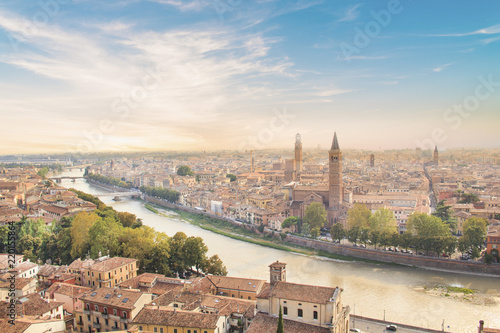 Beautiful view of the panorama of Verona and the Lamberti tower on the banks of the Adige River in Verona, Italy