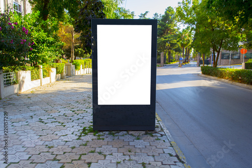Vászonkép Vertical blank billboard with copy space for your text message or content, outdoors advertising mock up, public information board on city road