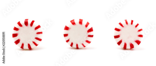 Three Round Peppermints on a White Background
