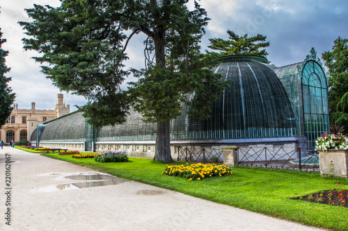 Romantic castle Lednice with flower garden and orangery at summer day, Czech republic