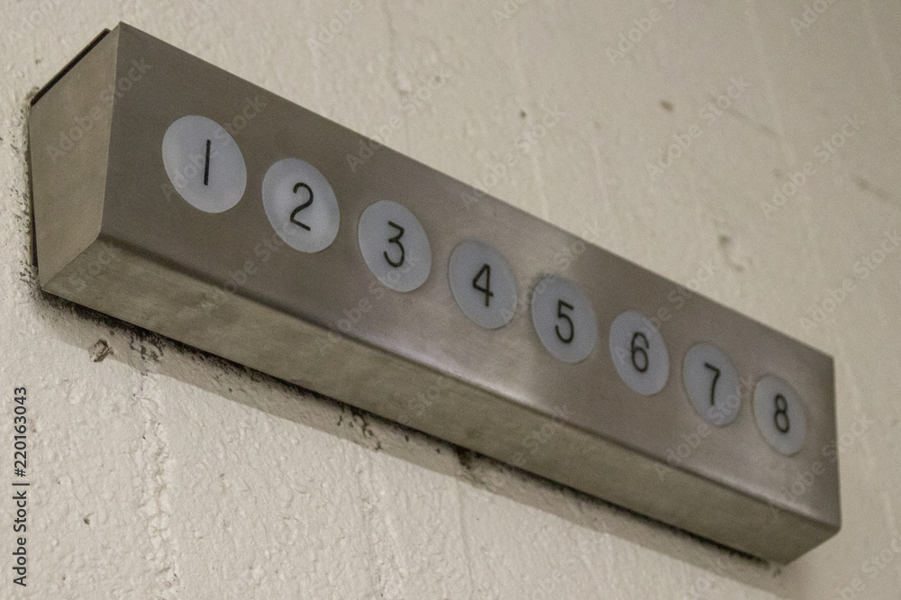 sign, white, elevator floors, numbers, number sign, steel Stock Photo