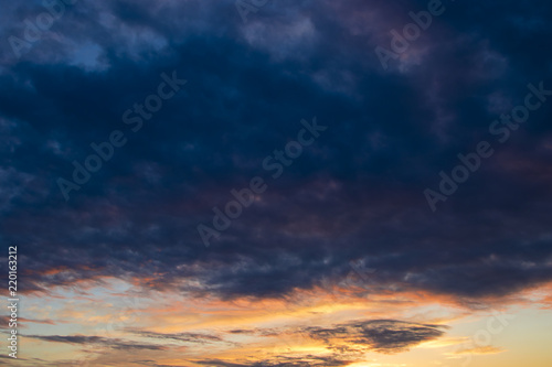 Beautiful clouds at sunset, abstract nature background © yauhenka