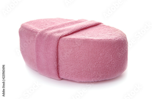 New pink bath sponge on white background