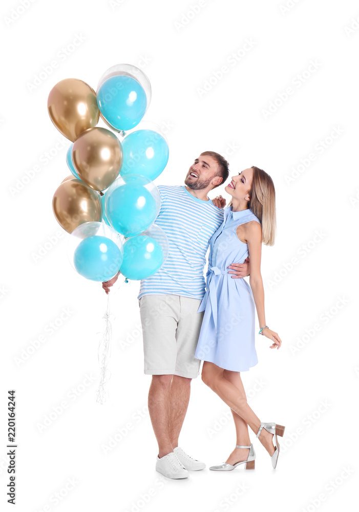 Young couple with air balloons on white background Young couple with air balloons on white background