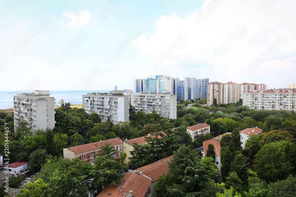 Picturesque view of city with beautiful buildings near sea