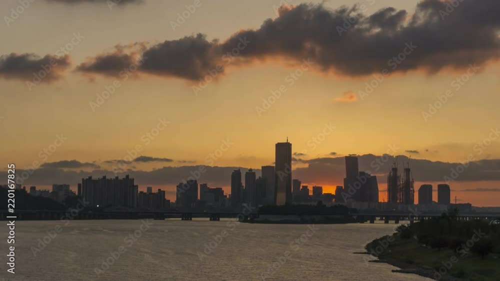 Sunset time-lapse of Downtown beyond the River Sunset time-lapse of Downtown beyond the River