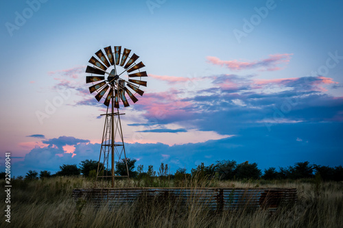 Sunset windmill with colorful clouds