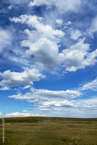 Clouds Sparse Blue Sky © John