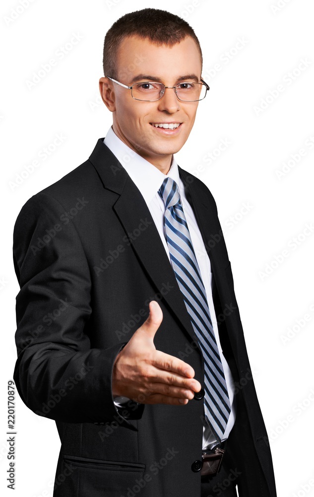 Young Businessman Offering Handshake with Glasses - Isolated Young Businessman Offering Handshake with Glasses - Isolated