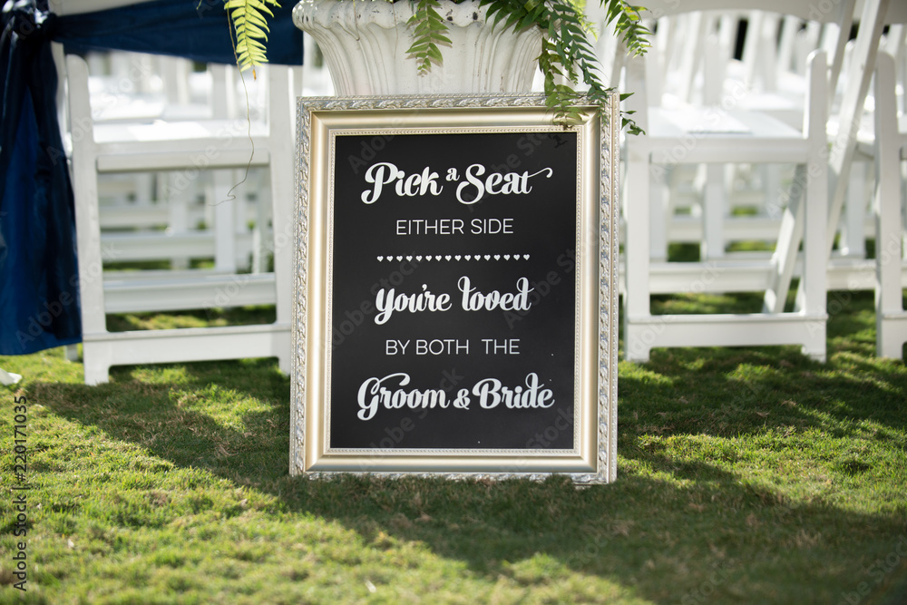 Wedding ceremony sign pick a seat not side Stock Photo
