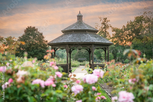 Serene Park Gazebo at Sunset in Rose Garden photo