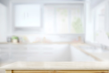 Empty Marble top table for product or food montage with modern kitchen room background.