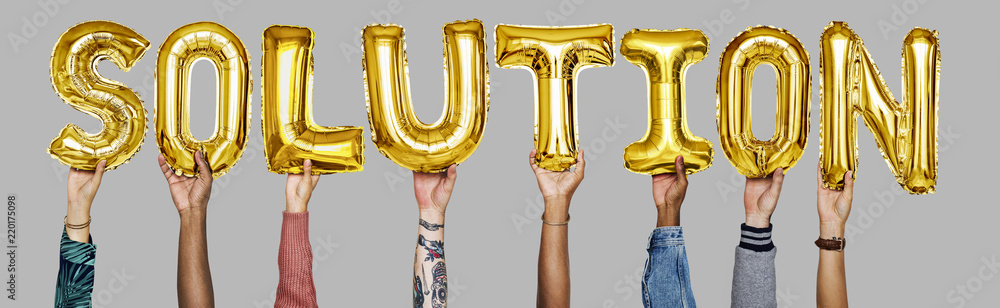 Gold yellow alphabet helium balloons forming the text solution Gold yellow alphabet helium balloons forming the text solution