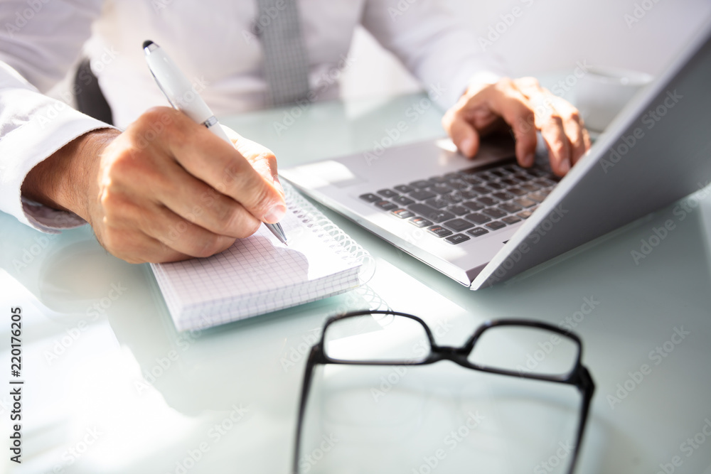 Businessman's Hand Writing In Diary Businessman's Hand Writing In Diary