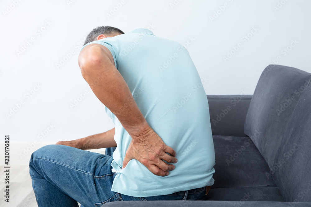 Mature Man Suffering From Back Pain Mature Man Suffering From Back Pain