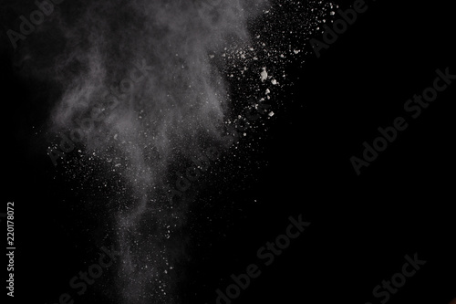 White powder explosion on white background. Colored cloud. Colorful dust explode. Paint Holi.