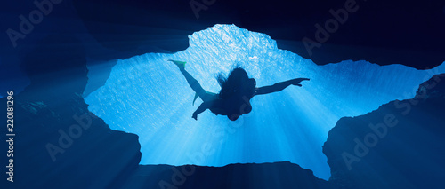 Fotografie, Obraz Diver swimming underwater