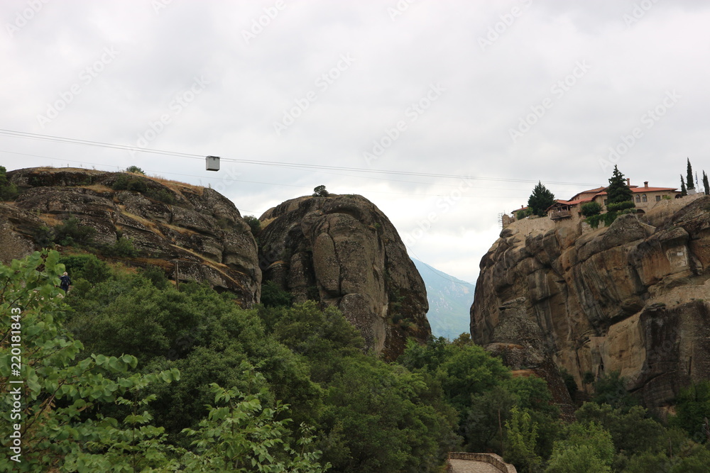 Fototapeta premium Transportation in cable car to monastery of Holy Trinity, Meteora, Thessaly, Greece
