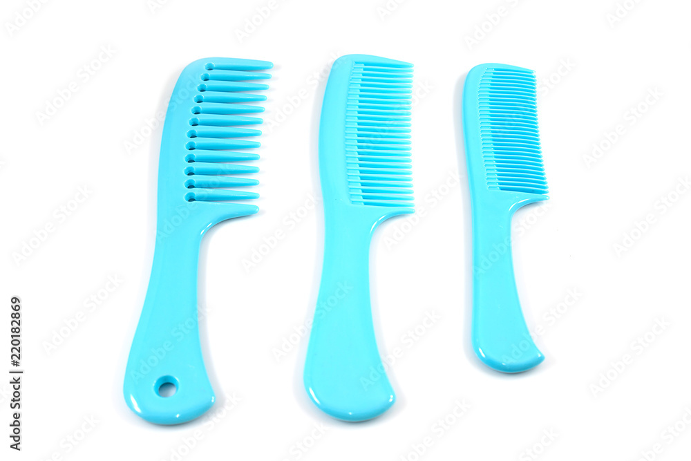 Set of blue plastic comb isolated on white background Set of blue plastic comb isolated on white background