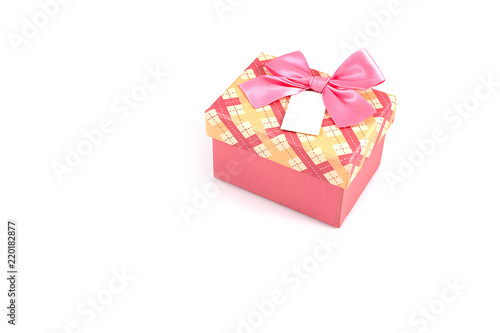 Pink gift box with ribbon bow isolated