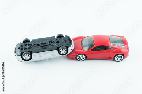 Close up of two cars accident, car crash insurance.Transport and accident concept on white background.. © Konkapp